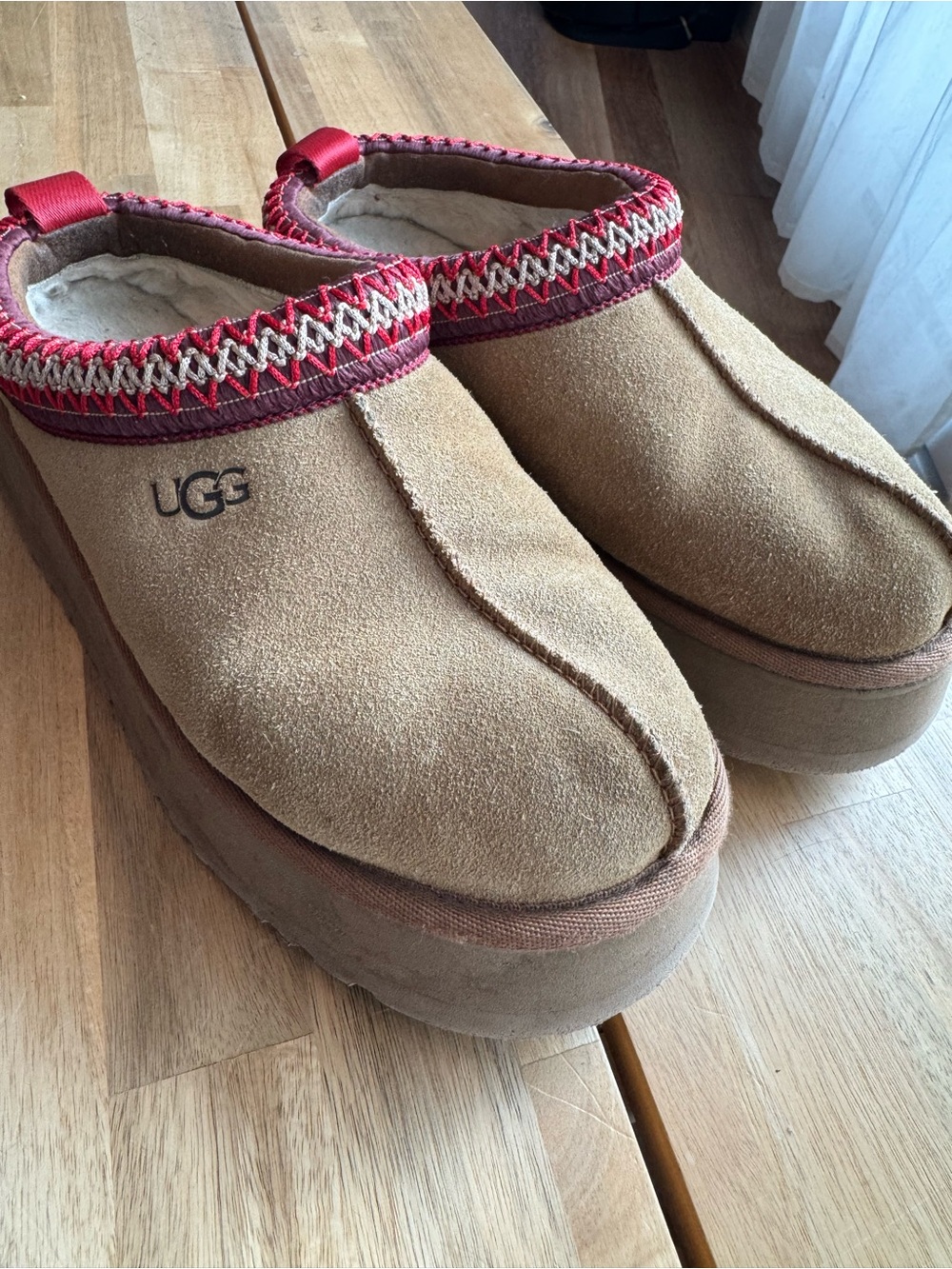 UGG Women's Chestnut Suede Slip-Ons with Red Trim